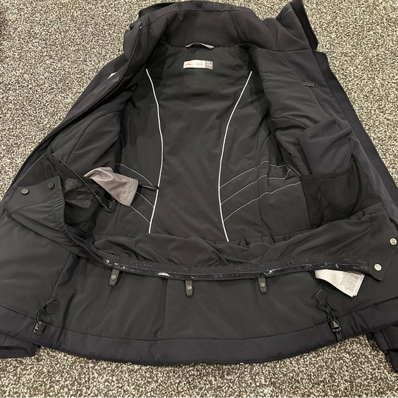 Kjus Women's Formula ski Jacket brand new. Black jacket size 32 - Picture 13 of 16